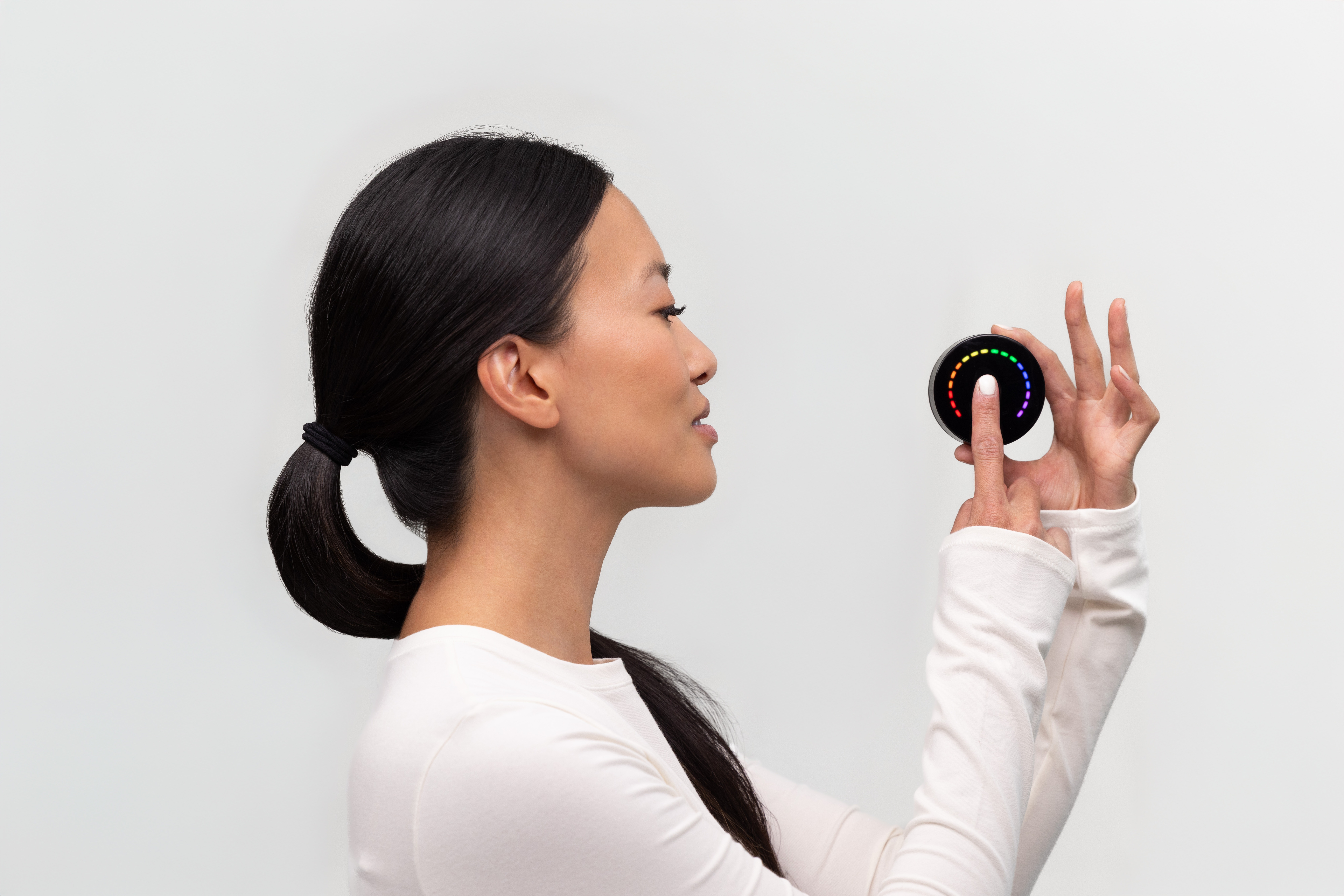 Person holding Prysm iO while scanning